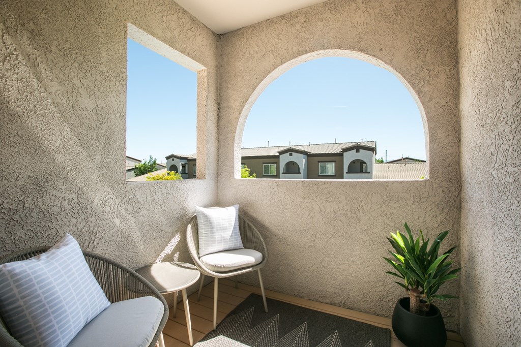 A Small Patio With Two Chairs at Cantata at the Trails, Albuquerque
