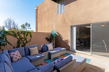 Patio with couches at Village Square, La Jolla, CA