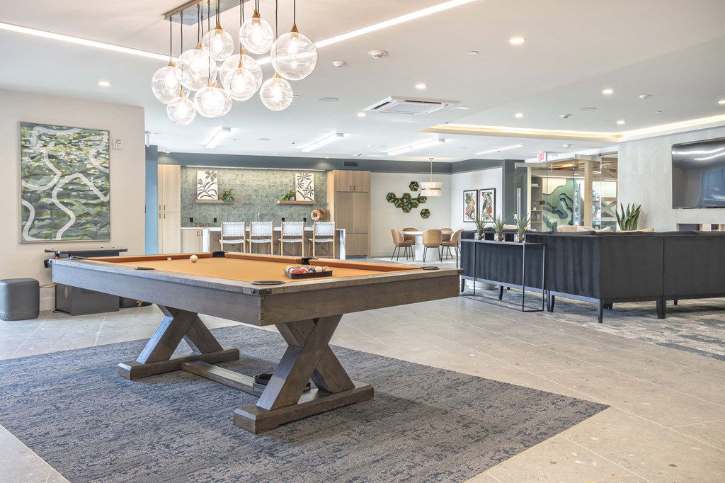 a pool table in a lobby of a building