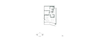 A floor plan of a house with a garage and a separate entrance.