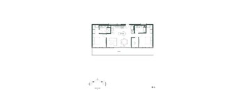 A floor plan of a house with a kitchen, living room, and two bedrooms.