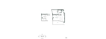 A black and white floor plan of a house with two bedrooms and a garage.