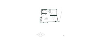 A black and white floor plan of a house with a kitchen, living room, and bathroom.