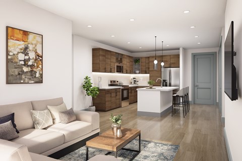 A modern living room with a white sofa and a coffee table.