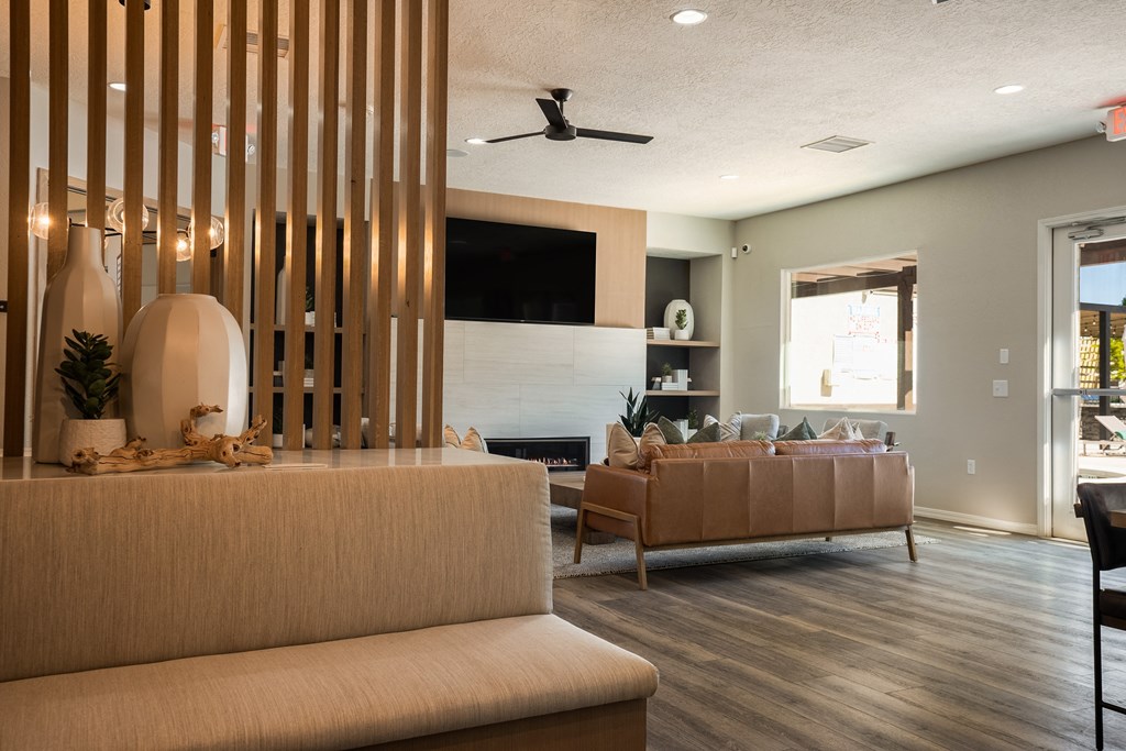 a living room with a couch and a tv