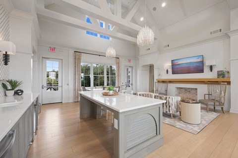 A modern kitchen with a large island in the middle.