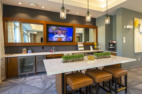 a kitchen with a marble counter top