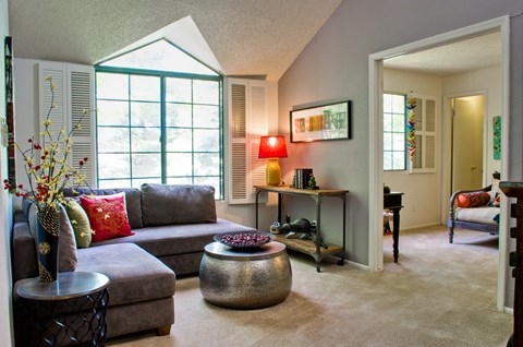 a living room with a couch and a table