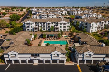 Drone View Of Property Drone View Of Property at SkyStone Apartments, New Mexico, 87114 - Photo Gallery 4