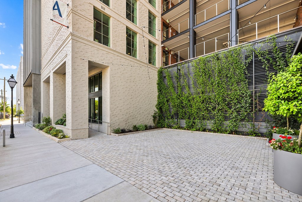 A building with a sign that starts with the letter A on it.