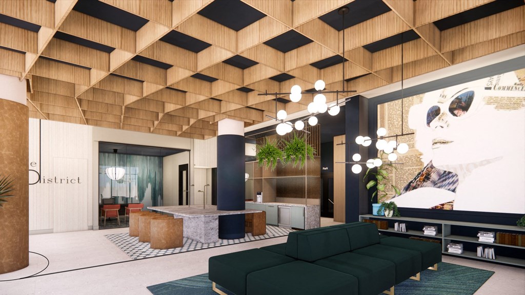 a rendering of a lobby with couches and a reception desk