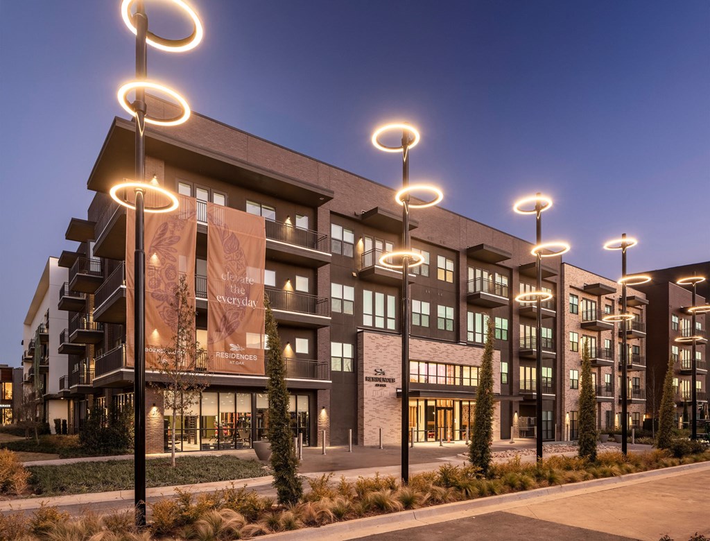 A modern building with a banner that reads "Welcome to the future".
