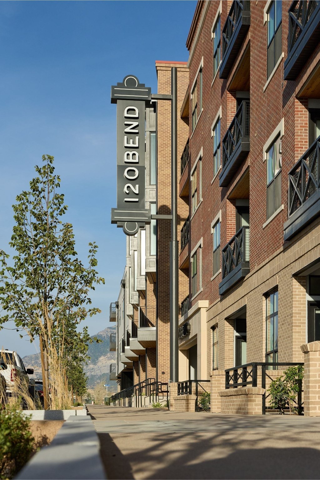 A street view of a building named 120 Bend.