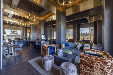 A modern living room with a large couch and a coffee table.