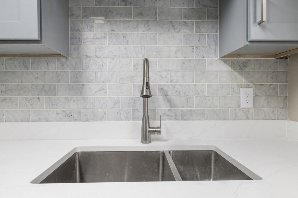 a close up of a sink in a kitchen