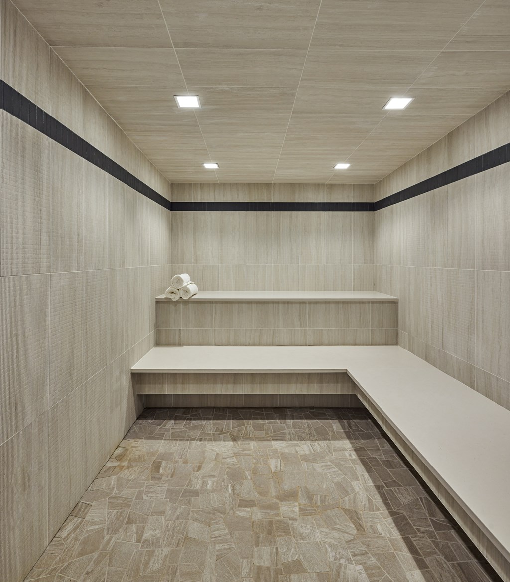 Indoor steam room with bench seating