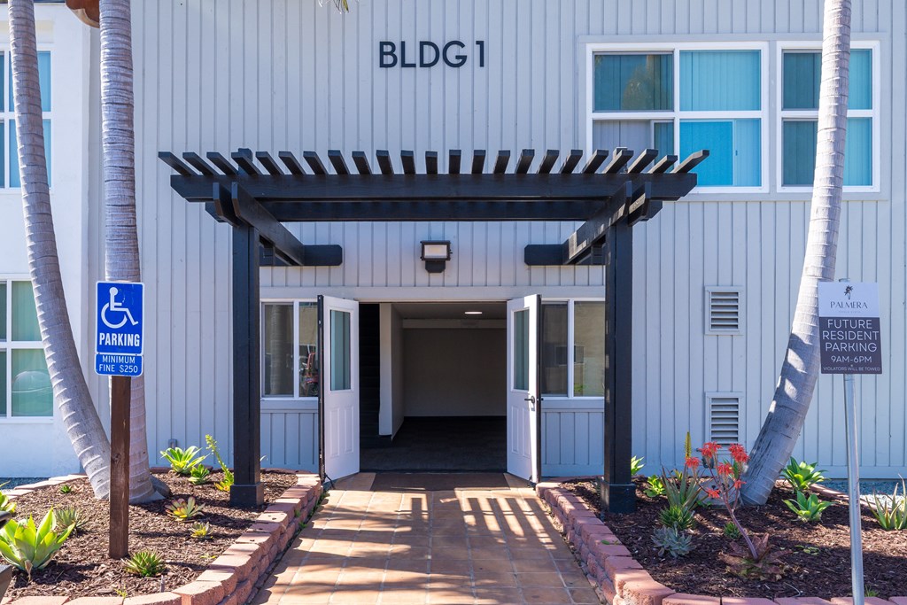 A building with the sign BLDG 1 on it.