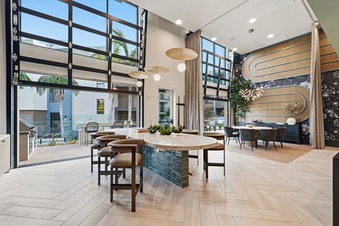 A modern interior with a bar and dining area.