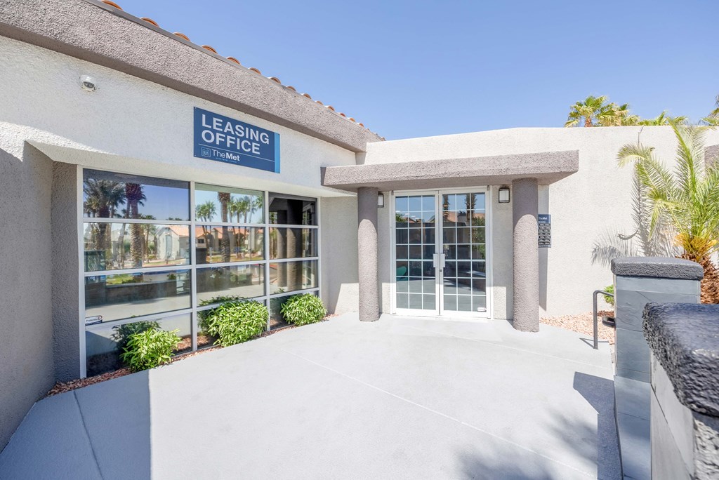 a building with a leasing office on the side of it