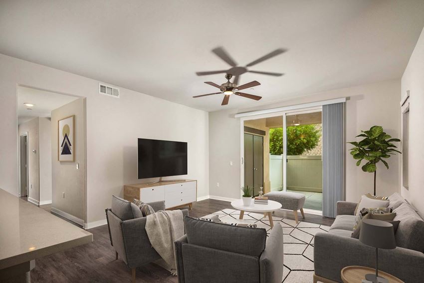 Lakeview 88 - Living room with white walls and a ceiling fan - Photo Gallery