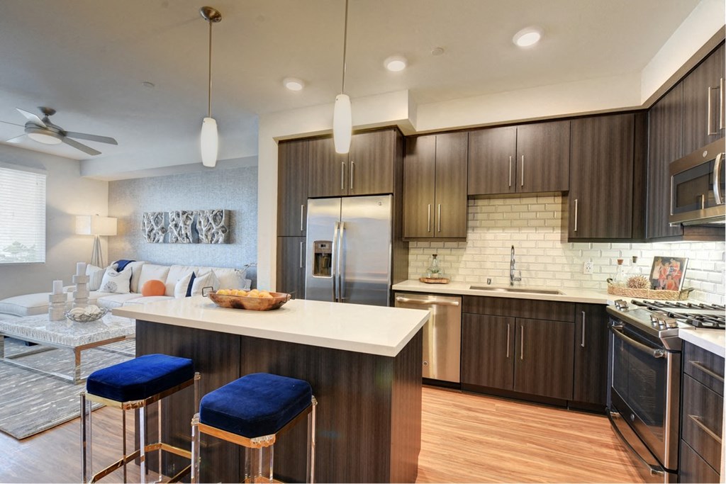 Gourmet Kitchens with Quartz Countertops and Island at Sola, California