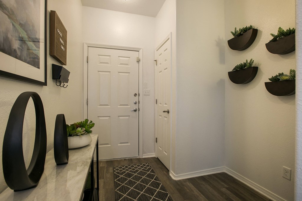 A Hallway With White Doors at Cantata at the Trails, Albuquerque, 87114