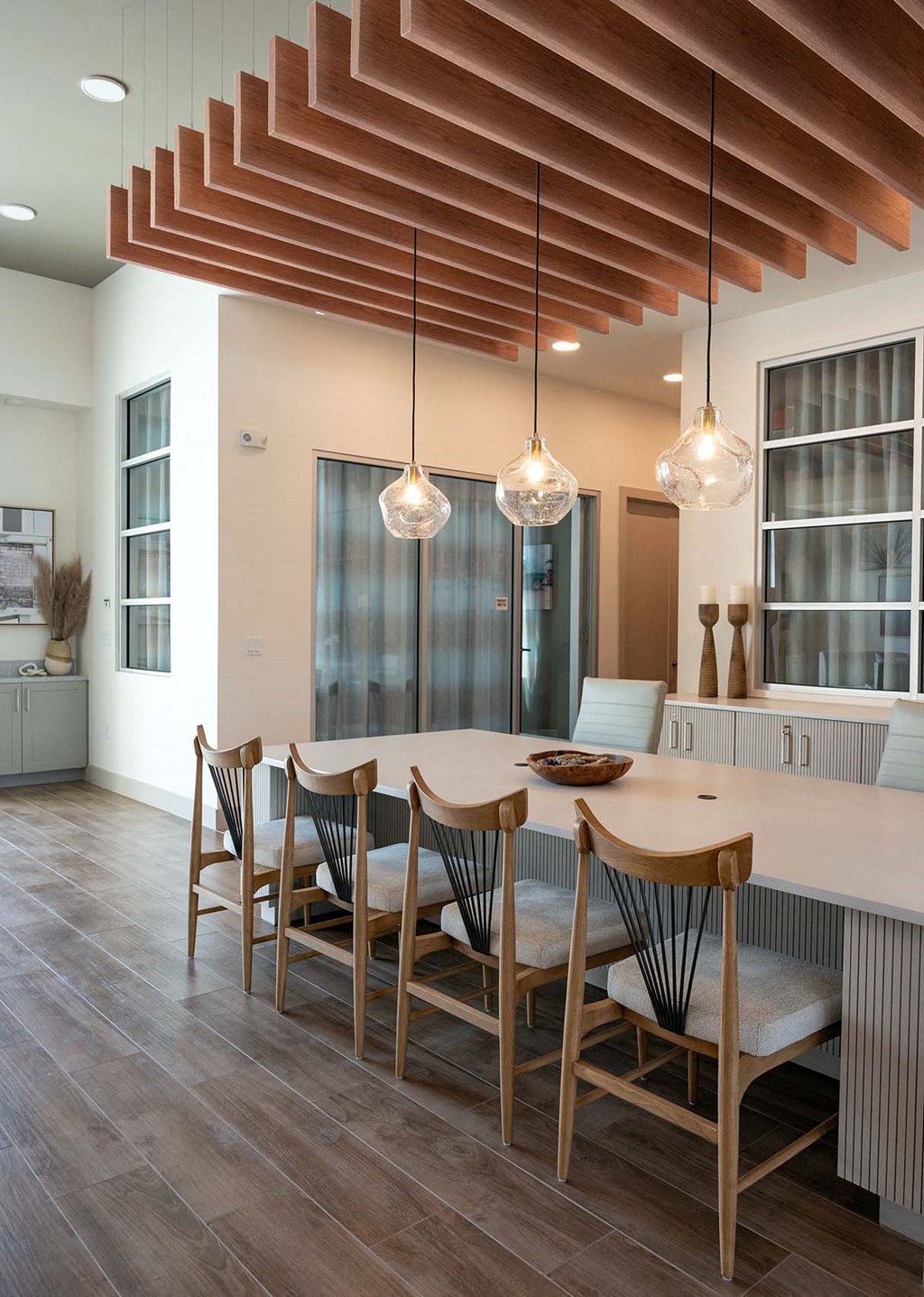 a dining room with a table and chairs