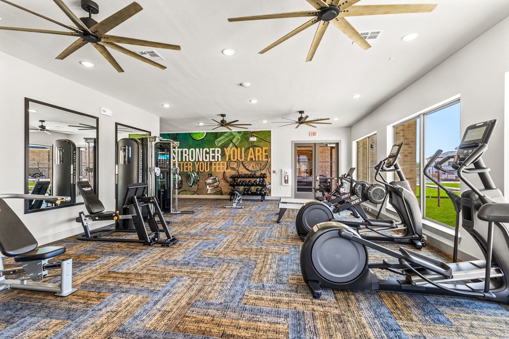 fitness center with exercise equipment