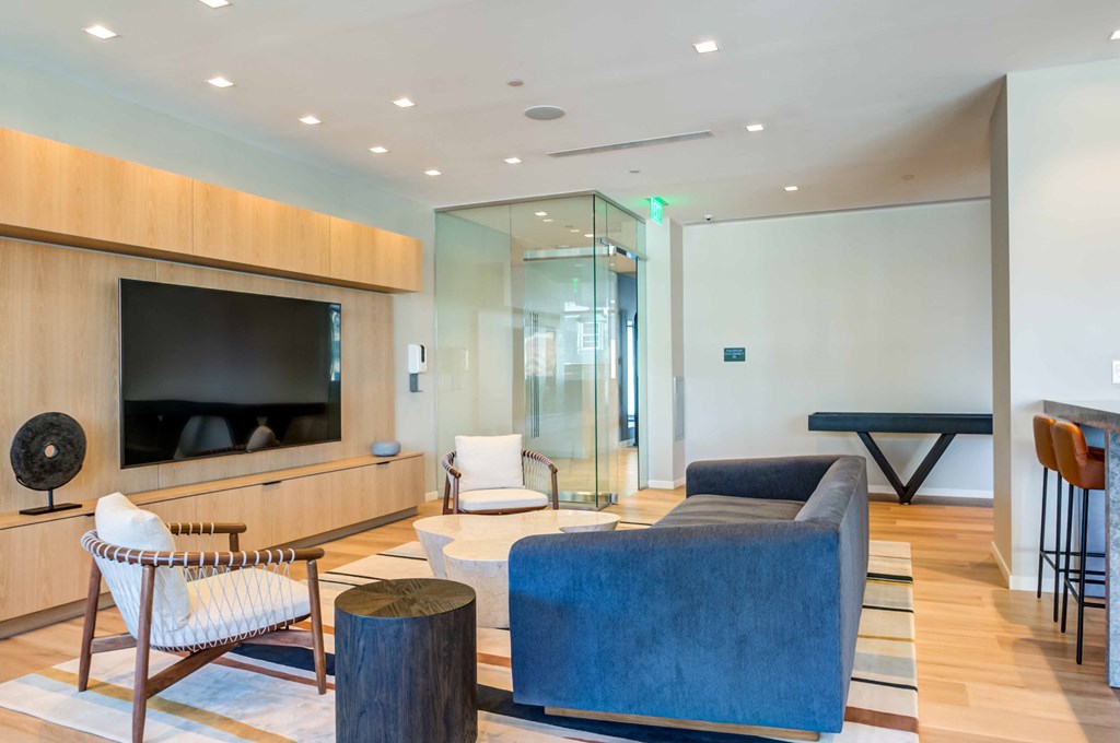 a living room with a couch and a television