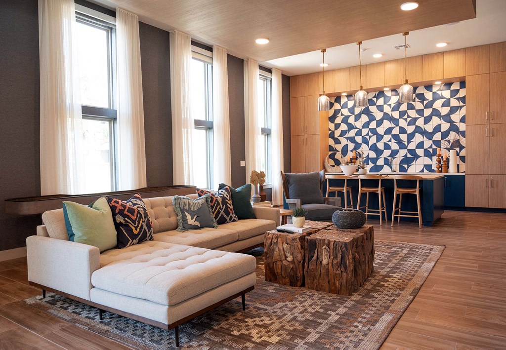 a living room with a couch and a table