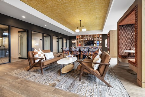 A modern living room with a wooden sofa and a coffee table.