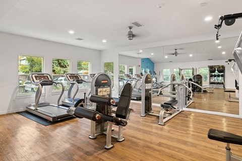Gym with cardio equipment and glass windows at Canyon Creek, Wilsonville, OR
