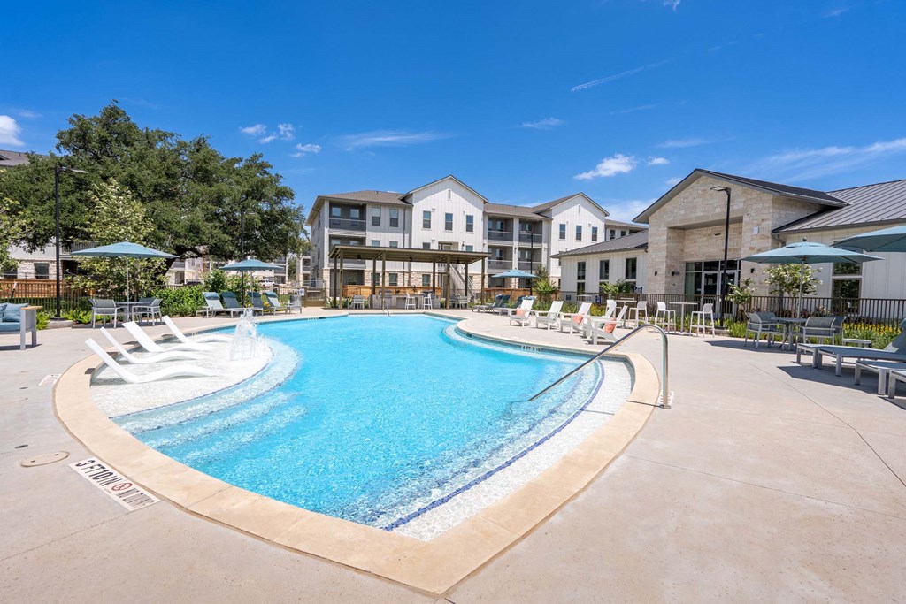 our apartments have a large pool with lounge chairs