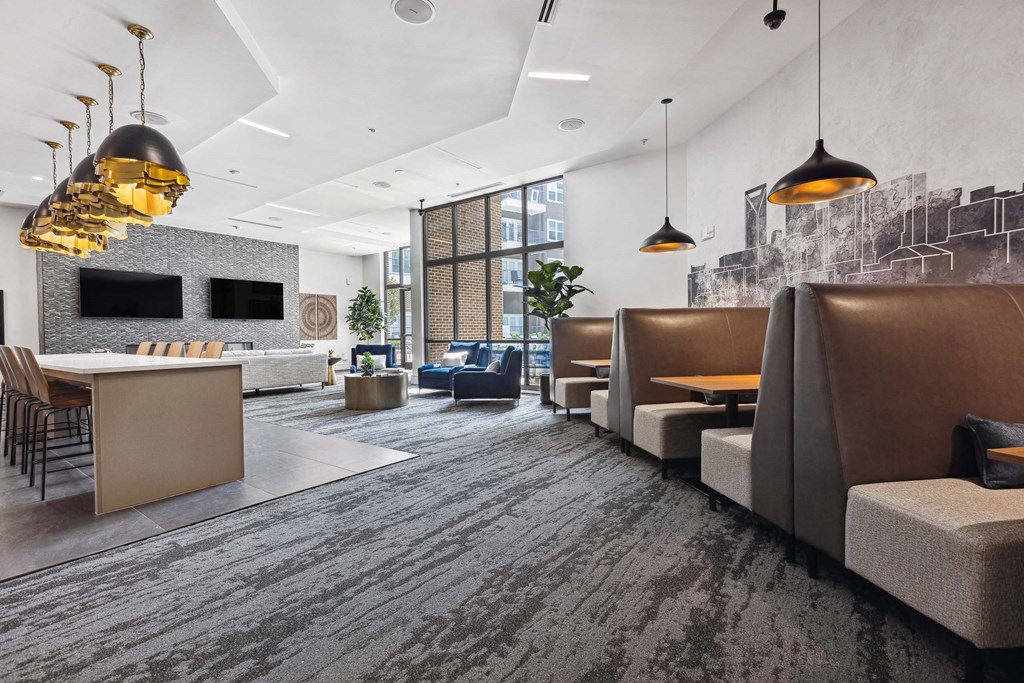 a large room with couches and chairs