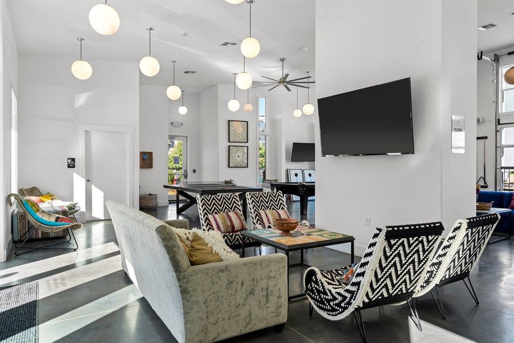 Seating area in front of hanging TV