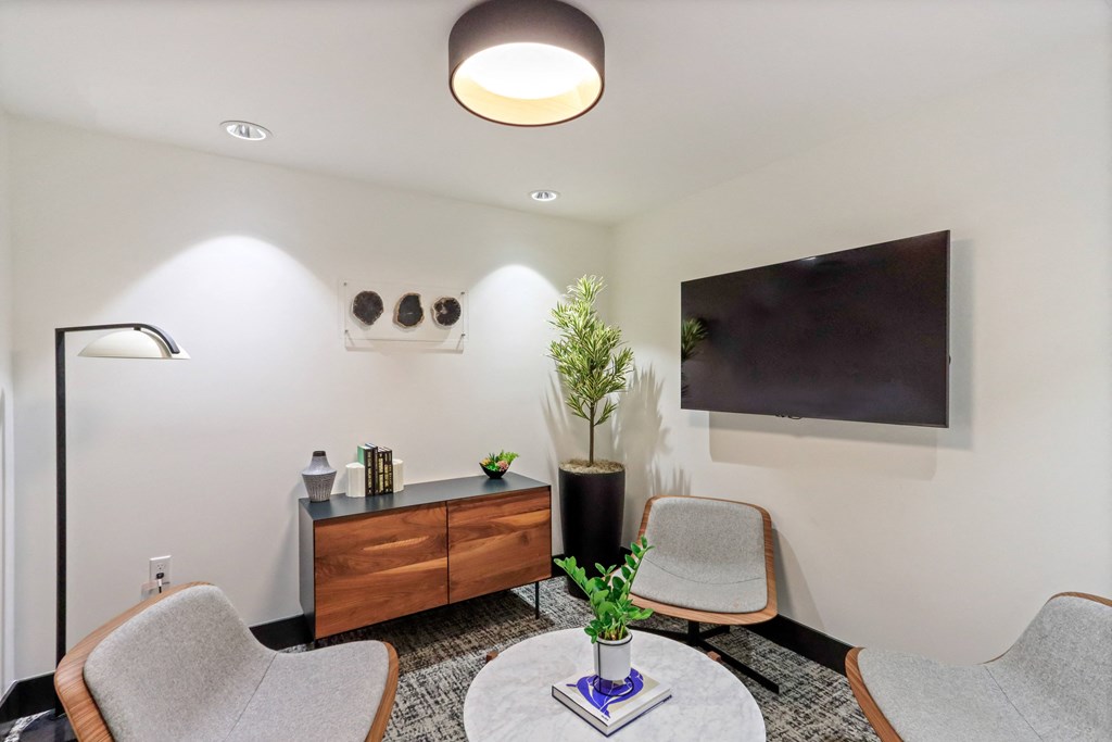 Room with a table and chairs and a flat screen tv on the wall at Array La Mesa, La Mesa, 91942