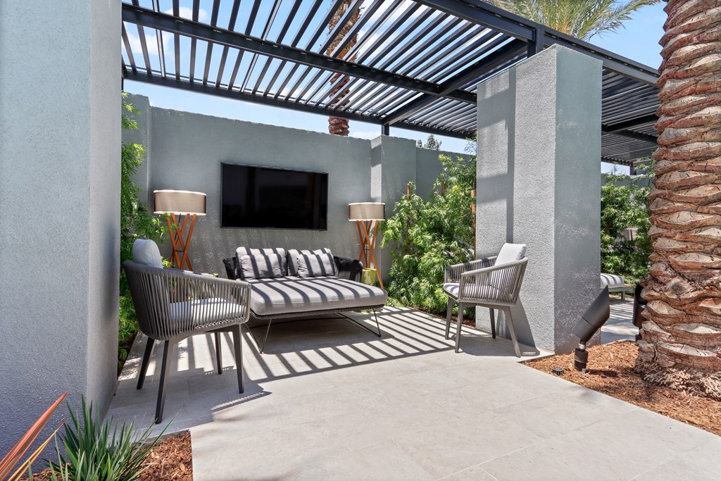Outdoor living area with a pergola and patio furniture at Array La Mesa, La Mesa, CA 91942