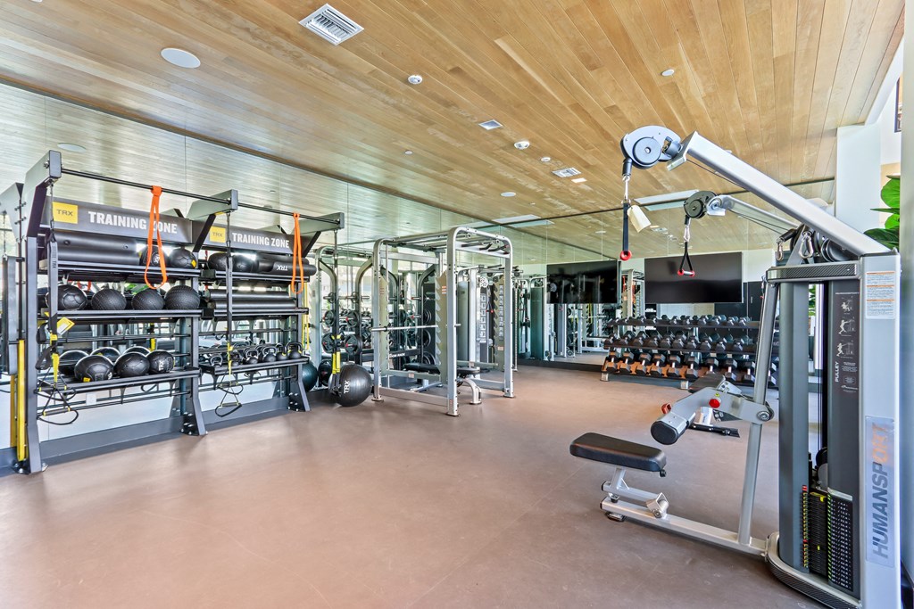 Fitness room with weights and cardio equipment at Array La Mesa, La Mesa, 91942