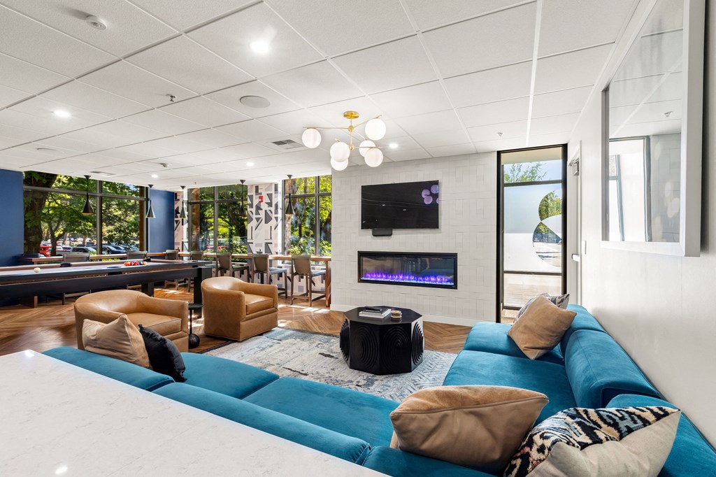 a living room with a blue couch