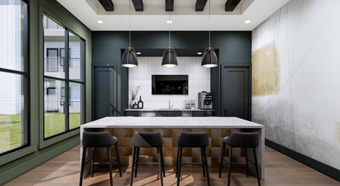 A modern kitchen with a white table and black chairs.