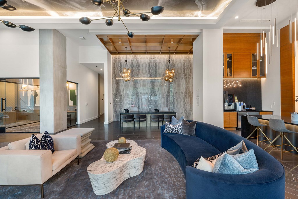 a living room with couches and a coffee table