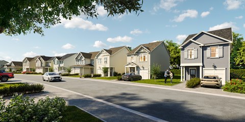 A row of houses with cars parked in front.