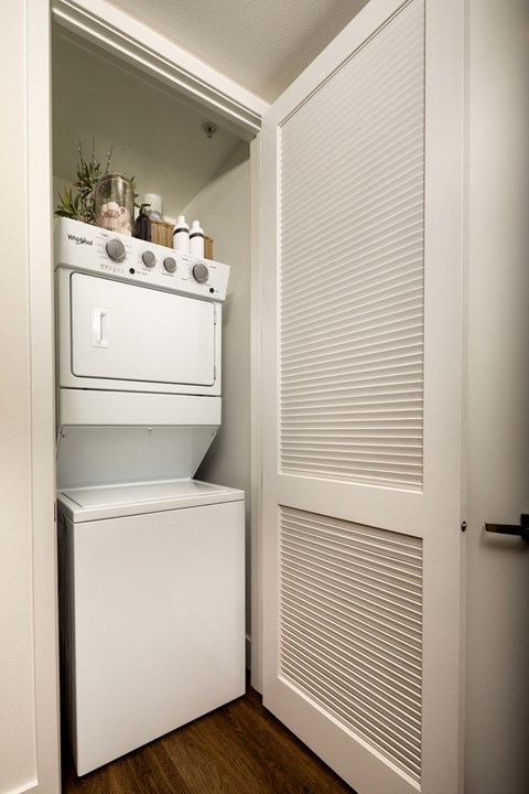 a laundry room with a washer and dryer