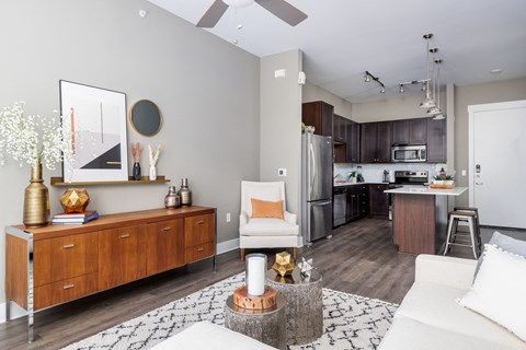Apartment living room with hardwood floors and 9 foot ceilings