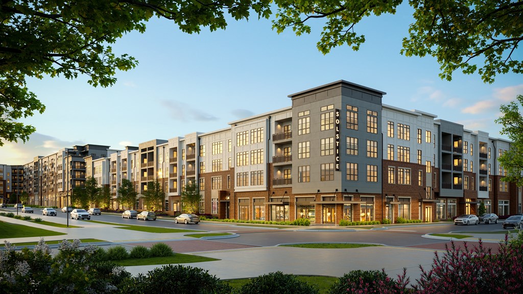 A row of modern apartment buildings are shown in the image.