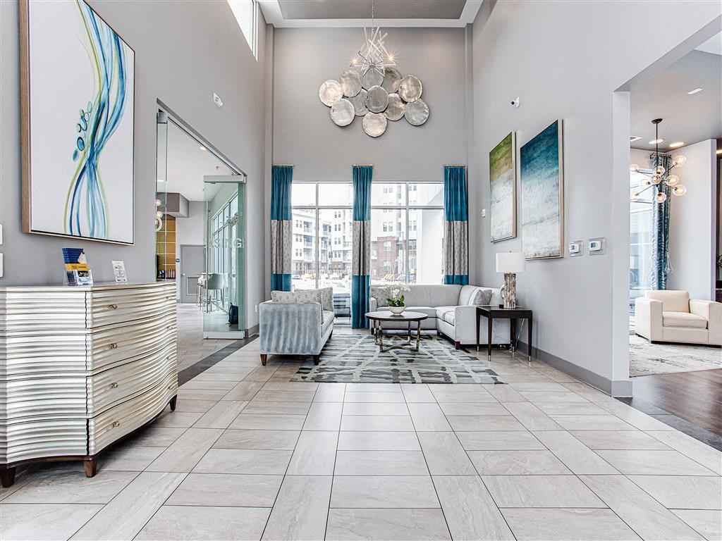 a lobby with two couches and a coffee table
