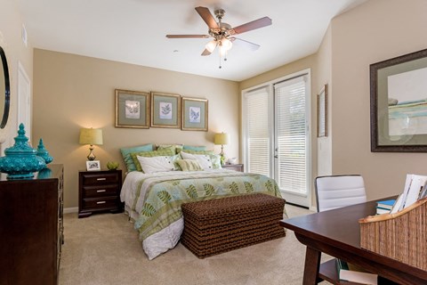 Bedroom With Ceiling Fan at RiverEdge Terrace, San Diego, California