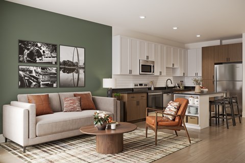 A modern kitchen with a white couch and a coffee table.