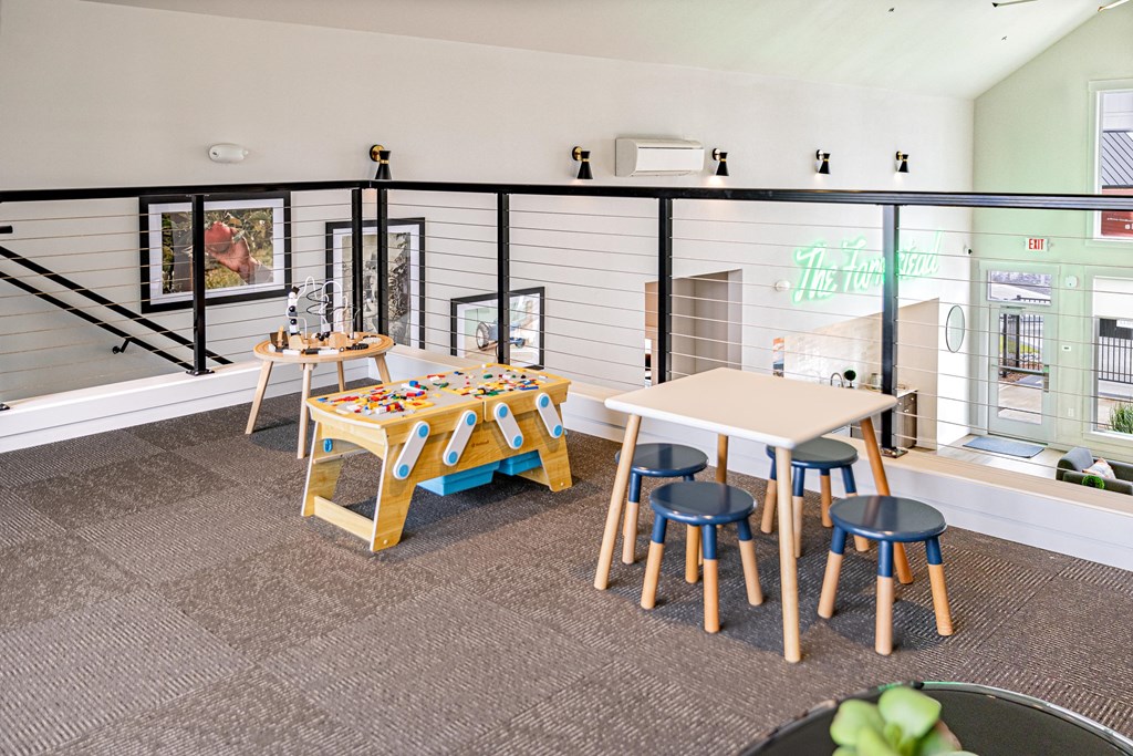 a room with tables and chairs in a classroom at The Farmstead, Washington, 98684