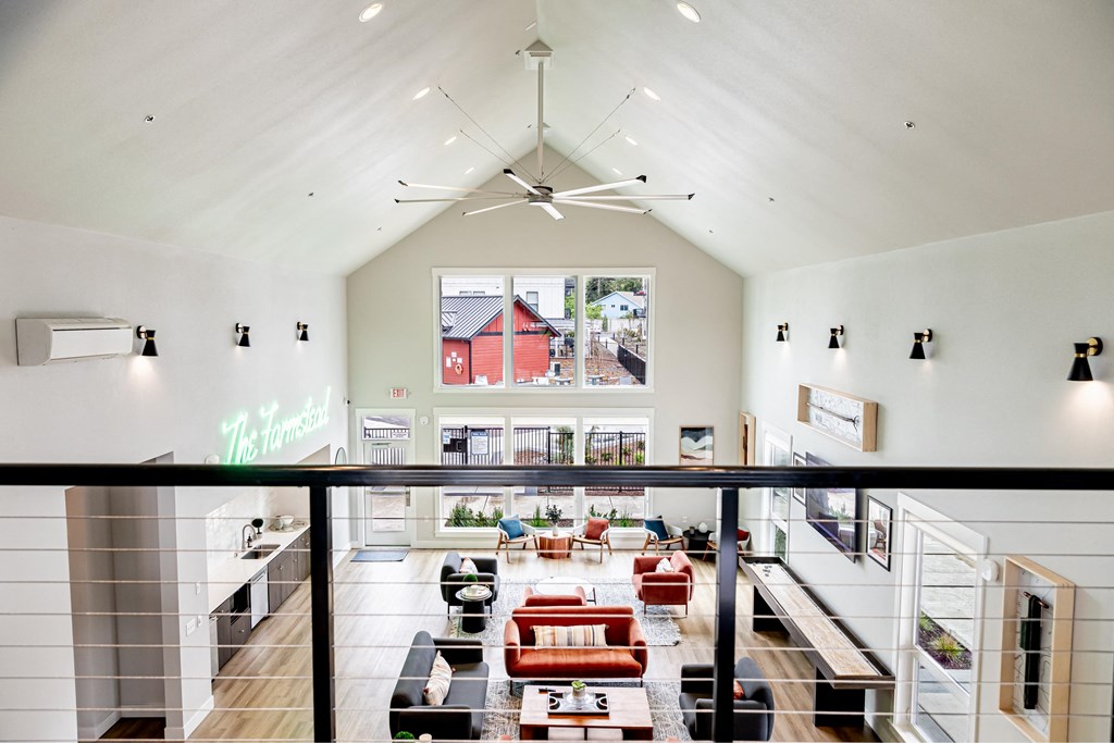 a view of a living room from the second floor of a house at The Farmstead, Vancouver, WA 